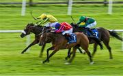 19 July 2020; Fame And Acclaim, centre, with Declan McDonagh up, races alongside eventual second place Frank Arthur, left, with Colin Keane up, on their way to winning the Evoke.ie Handicap at The Curragh Racecourse in Kildare. Racing remains behind closed doors to the public under guidelines of the Irish Government in an effort to contain the spread of the Coronavirus (COVID-19) pandemic. Photo by Seb Daly/Sportsfile