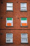 21 July 2020; Republic of Ireland flags hang from windows at The Iveagh Trust Kevin Street in Dublin during a rememberance for Jack Charlton on the day of his funeral in Newcastle, England. The former Republic of Ireland manager Jack Charlton lead the Republic of Ireland team to their first major finals at UEFA Euro 1988, and subsequently the FIFA World Cup 1990, in Italy, and the FIFA World Cup 1994, in USA.  Photo by Stephen McCarthy/Sportsfile