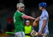 24 July 2020; Robbie Egan of Kilmallock with Padraic Kennedy of Na Piarsaigh after the Limerick County Senior Hurling Championship Round 1 match between Kilmallock and Na Piarsaigh at LIT Gaelic Grounds in Limerick. GAA matches continue to take place in front of a limited number of people in an effort to contain the spread of the coronavirus (Covid-19) pandemic. Photo by Piaras Ó Mídheach/Sportsfile