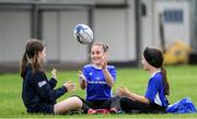 29 July 2020; Sophia Riordan, age 11, with Erin Steed, left, age 11, and Lilly Kavanagh, right, age 11, during the Bank of Ireland Leinster Rugby Summer Camp at Clondalkin RFC in Dublin. Photo by Matt Browne/Sportsfile
