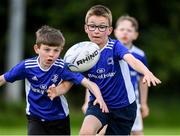 29 July 2020; Sean Tadhg Byrne, left, in action with Tom Gahan during the Bank of Ireland Leinster Rugby Summer Camp at Clondalkin RFC in Dublin. Photo by Matt Browne/Sportsfile