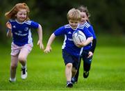 29 July 2020; Conor Kearney, age 6, in action during the Bank of Ireland Leinster Rugby Summer Camp at Clondalkin RFC in Dublin. Photo by Matt Browne/Sportsfile