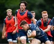 10 August 2020; Garry Ringrose is tackled by Ciarán Frawley during Leinster Rugby squad training at UCD in Dublin. Photo by Ramsey Cardy/Sportsfile