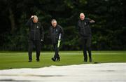 27 August 2020; Umpires, from left, Mark Hawthorne, Simon Burrowes and Roly Black inspect the field prior to the 2020 Test Triangle Inter-Provincial Series match between Northern Knights and Munster Reds at Stormont Cricket Club in Belfast. Photo by Seb Daly/Sportsfile