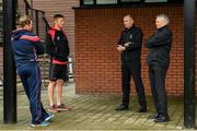27 August 2020; Umpires Mark Hawthorne, right, and Roly Black brief team captains Gary Wilson of Northern Knights, left, and Jack Tector of Munster Reds regarding the current weather conditions prior to the 2020 Test Triangle Inter-Provincial Series match between Northern Knights and Munster Reds at Stormont Cricket Club in Belfast. Photo by Seb Daly/Sportsfile