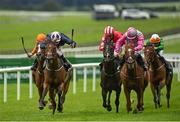 28 August 2020; Laughifuwant, left, with Colin Keane up, races alongside eventual third place Breaking Story, right, with Robbie Colgan up, on their way to winning the Paddy Power Irish Cambridgeshire at The Curragh Racecourse in Kildare. Photo by Seb Daly/Sportsfile