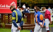 16 September 2020; Jockey Billy Lee, left, observes a minute's silence alongside his colleagues in the parade ring at Cork Racecourse in Mallow in memory of former jockey Pat Smullen, who passed away yesterday September 15. Photo by Seb Daly/Sportsfile