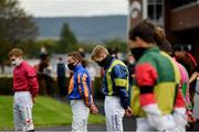 16 September 2020; Jockey Billy Lee, centre, observes a minute's silence alongside his colleagues in the parade ring at Cork Racecourse in Mallow in memory of former jockey Pat Smullen, who passed away yesterday September 15. Photo by Seb Daly/Sportsfile
