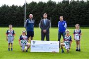 23 September 2020; Skryne GFC has been boosted with the news that it has claimed first prize in the 2020 Kellogg’s GAA Cúl Camps on-pack promotion, claiming a huge €25,000 for the club. Pictured is David Byrne from Kellogg’s with former Meath football's Damien Sheridan, Meath GAA Coaching & Games and Kellogg’s GAA Cúl Camp co-ordinator, Trevor Giles Skryne GFC coach and, from left, Chris O’Connor, age 9, Katie O’Connor, age 11, Oisin Giles, age 10 and Emily Philips, age 11. Photo by Matt Browne/Sportsfile