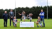 23 September 2020; Skryne GFC has been boosted with the news that it has claimed first prize in the 2020 Kellogg’s GAA Cúl Camps on-pack promotion, claiming a huge €25,000 for the club. Pictured is, from left, Senan McGrath, Chair of Skryne GFC Club, David Byrne from Kellogg’s, Katie O’Connor, age 11, Emily Philips, age 11, Chris O’Connor, age 9, Oisin Giles, age 10, former Meath football and Skryne GFC coach Trevor Giles. Photo by Matt Browne/Sportsfile