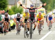 3 July 2013; Jack Sadler, Munster Sensa, celebrates as he takes victory on Stage 2 on the 2013 Junior Tour of Ireland, Ennis - Barefield, Co. Clare. Picture credit: Stephen McMahon / SPORTSFILE