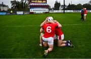 4 October 2020; St Thomas players, from left, Fintan Burke, Shane Cooney and Evan Duggan celebrate following the Galway County Senior Hurling Championship Final match between Turloughmore and St Thomas at Kenny Park in Athenry, Galway. Photo by David Fitzgerald/Sportsfile
