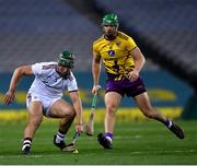 31 October 2020; Fintan Burke of Galway in action against Matthew O’Hanlon of Wexford during the Leinster GAA Hurling Senior Championship Semi-Final match between Galway and Wexford at Croke Park in Dublin. Photo by Ray McManus/Sportsfile