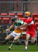 7 November 2020; Colm Gath of Offaly in action against Paddy Kelly of Derry during the Christy Ring Cup Round 2B match between Derry and Offaly at Páirc Esler in Newry, Down. Photo by Sam Barnes/Sportsfile