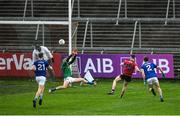 15 November 2020; Ceilium Doherty of Down scores his side's first goal past Raymond Galligan of Cavan during the Ulster GAA Football Senior Championship Semi-Final match between Cavan and Down at Athletic Grounds in Armagh. Photo by Daire Brennan/Sportsfile