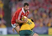 6 July 2013; Alex Corbisiero, British & Irish Lions, is tackled by Christian Lealiifano, Australia. British & Irish Lions Tour 2013, 3rd Test, Australia v British & Irish Lions. ANZ Stadium, Sydney Olympic Park, Sydney, Australia. Picture credit: Stephen McCarthy / SPORTSFILE