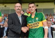 7 July 2013; Kerry's Jack Savage with Mike Counihan, CRM Electric Ireland, after he was named Man of the Match. Electric Ireland Munster GAA Football Minor Championship Final, Kerry v Tipperary, Fitzgerald Stadium, Killarney, Co. Kerry. Picture credit: Diarmuid Greene / SPORTSFILE