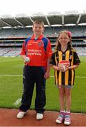 7 July 2013; Holly McGuinness and Keith Leonard are pictured at the Electric Ireland Leinster GAA Minor Hurling Championship Final, where they were the official ball-carriers and had the honour of presenting the match sliotar to the referee before the game. Holly and Keith won their prizes through Electric Ireland’s Facebook page www.facebook.com/ElectricIreland. Electric Ireland Leinster GAA Hurling Minor Championship Final, Laois v Kilkenny, Croke Park, Dublin. Picture credit: David Maher / SPORTSFILE
