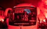 7 December 2020; Dundalk interim head coach Filippo Giovagnoli, right, and goalkeeping coach Steve Williams, centre, with the Extra.ie FAI Cup during the Dundalk squads return to Dundalk after defeating Shamrock Rovers in the Extra.ie FAI Cup Final match in the Aviva Stadium in Dublin earlier. The players and staff stayed on the bus due to COVID-19 restrictions. Photo by Ben McShane/Sportsfile