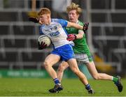 12 December 2020; Rian Hayes of Waterford in action against Oisin Enright of Limerick during the Electric Ireland Munster GAA Football Minor Championship Quarter-Final match between Limerick and Waterford at LIT Gaelic Grounds in Limerick. Photo by Matt Browne/Sportsfile
