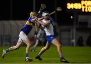 15 December 2020; Paddy Leevy of Waterford in action against Conor Bowe of Tipperary during the Bord Gáis Energy Munster GAA Hurling U20 Championship Semi-Final match between Waterford and Tipperary at Fraher Field in Dungarvan, Waterford. Photo by Matt Browne/Sportsfile