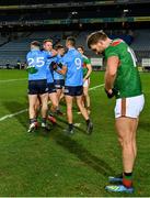 19 December 2020; Dublin players, from left, Philip McMahon, Brian Fenton and James McCarthy celebrates in front of Mayo's Aidan O'Shea following their side's victory during the GAA Football All-Ireland Senior Championship Final match between Dublin and Mayo at Croke Park in Dublin. Photo by Seb Daly/Sportsfile