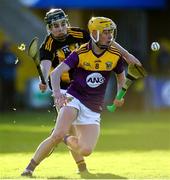 20 December 2020; Oisín Pepper of Wexford in action against Harry Shine of Kilkenny during the Electric Ireland Leinster GAA Hurling Minor Championship Semi-Final match between Wexford and Kilkenny at Chadwicks Wexford Park in Wexford. Photo by Seb Daly/Sportsfile