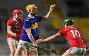 23 December 2020; Andrew Ormond of Tipperary in action against Ciarán Joyce, left, and Eoin Carey of Cork during the Bord Gáis Energy Munster GAA Hurling U20 Championship Final match between Cork and Tipperary at Páirc Uí Chaoimh in Cork. Photo by Piaras Ó Mídheach/Sportsfile