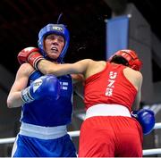 25 February 2021; Mira Potkonen of Finland, right, and Raykhona Kodirova of Uzbekistan compete in their women's welterweight 60kg quarter-final bout during the AIBA Strandja Memorial Boxing Tournament Quarter-Finals at Sofia in Bulgaria. Photo by Alex Nicodim/Sportsfile