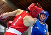 25 February 2021; Mira Potkonen of Finland, left, and Raykhona Kodirova of Uzbekistan compete in their women's welterweight 60kg quarter-final bout during the AIBA Strandja Memorial Boxing Tournament Quarter-Finals at Sofia in Bulgaria. Photo by Alex Nicodim/Sportsfile