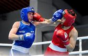 25 February 2021; Mira Potkonen of Finland, right, and Raykhona Kodirova of Uzbekistan compete in their women's welterweight 60kg quarter-final bout during the AIBA Strandja Memorial Boxing Tournament Quarter-Finals at Sofia in Bulgaria. Photo by Alex Nicodim/Sportsfile