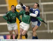 1 February 2004; Stephen Kelly, Limerick, is tackled by Tom Kelly, Laois. Allianz National Football League Division 1A, Limerick v Laois, Gaelic Grounds, Limerick. Picture credit; Matt Browne / SPORTSFILE *EDI*