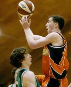 30 January 2004; John Behan, Dart Killester, in action against Scott Kinevane, Shamrock Rovers. National Basketball Cup 2004, Junior Men's Semi-Final, Dart Killester v Shamrock Rovers, The ESB Arena, Tallaght, Dublin. Picture credit; Brendan Moran / SPORTSFILE *EDI*