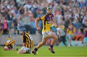 10 July 2013; Wexford's Conor McDonald celebrates at the final whistle as Kilkenny's Padraig Walsh, left, and Luke Harney drop to their knees. Bord Gáis Energy Leinster GAA Hurling Under 21 Championship Final, Kilkenny v Wexford, Wexford Park, Wexford. Picture credit: Matt Browne / SPORTSFILE