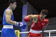 26 February 2021; Maxym Kots of Ukraine, right, and Dilshodbek Ruzmetov of Uzbekistan during their men's light heavyweight 81kg semi-final bout at the AIBA Strandja Memorial Boxing Tournament in Sofia, Bulgaria. Photo by Alex Nicodim/Sportsfile