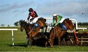 11 March 2021; Toms Courage, with Martin Burke up, left, jump the last alongside Danegeld, with Mike O'Connor, who came third, on their way to winning the Killinan Handicap hurdle at Thurles Racecourse in Tipperary. Photo by David Fitzgerald/Sportsfile