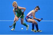 14 March 2021; Niamh Carey of Ireland in action against Fiona Crackles of Great Britain during the SoftCo Series International Hockey match between Ireland and Great Britain at Queens University Sports Grounds in Belfast. Photo by Ramsey Cardy/Sportsfile