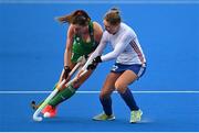 14 March 2021; Deirdre Duke of Ireland in action against Lizzie Neal of Great Britain during the SoftCo Series International Hockey match between Ireland and Great Britain at Queens University Sports Grounds in Belfast. Photo by Ramsey Cardy/Sportsfile