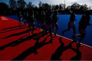 16 March 2021; Ireland players warm up ahead of the SoftCo Series International Hockey match between Ireland and Great Britain at Queens University Sports Grounds in Belfast. Photo by Ramsey Cardy/Sportsfile