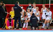 16 March 2021; Ireland players listen to a team-talk at half-time during the SoftCo Series International Hockey match between Ireland and Great Britain at Queens University Sports Grounds in Belfast. Photo by Ramsey Cardy/Sportsfile