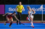 16 March 2021; Chloe Watkins of Ireland in action against Fiona Crackles of Great Britain during the SoftCo Series International Hockey match between Ireland and Great Britain at Queens University Sports Grounds in Belfast. Photo by Ramsey Cardy/Sportsfile