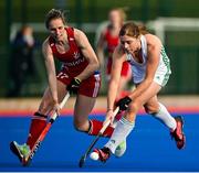 16 March 2021; Katie Mullan of Ireland in action against Jo Hunter of Great Britain during the SoftCo Series International Hockey match between Ireland and Great Britain at Queens University Sports Grounds in Belfast. Photo by Ramsey Cardy/Sportsfile