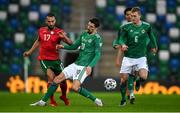 31 March 2021; Georgi Yomov of Bulgaria is tackled by Craig Cathcart of Northern Ireland during the FIFA World Cup 2022 qualifying group C match between Northern Ireland and Bulgaria at the National Football Stadium in Windsor Park, Belfast. Photo by David Fitzgerald/Sportsfile