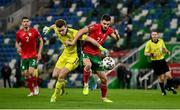 31 March 2021; Andrea Hristov of Bulgaria tussles with Northern Ireland goalkeeper Bailey Peacock-Farrell during the FIFA World Cup 2022 qualifying group C match between Northern Ireland and Bulgaria at the National Football Stadium in Windsor Park, Belfast. Photo by David Fitzgerald/Sportsfile