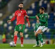 31 March 2021; Dimitar Iliev of Bulgaria in action against Niall McGinn of Northern Ireland during the FIFA World Cup 2022 qualifying group C match between Northern Ireland and Bulgaria at the National Football Stadium in Windsor Park, Belfast. Photo by David Fitzgerald/Sportsfile