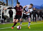 9 April 2021; Andy Lyons of Bohemians in action against Cameron Dummigan of Dundalk during the SSE Airtricity League Premier Division match between Dundalk and Bohemians at Oriel Park in Dundalk, Louth. Photo by Ben McShane/Sportsfile