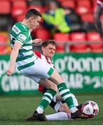 13 April 2021; Gary O'Neill of Shamrock Rovers is tackled by Ronan Boyce of Derry City during the SSE Airtricity League Premier Division match between Derry City and Shamrock Rovers at the Ryan McBride Brandywell Stadium in Derry. Photo by Stephen McCarthy/Sportsfile