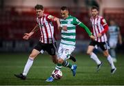 13 April 2021; Graham Burke of Shamrock Rovers in action against Ronan Boyce of Derry City during the SSE Airtricity League Premier Division match between Derry City and Shamrock Rovers at the Ryan McBride Brandywell Stadium in Derry. Photo by Stephen McCarthy/Sportsfile