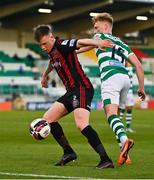 23 April 2021; Andy Lyons of Bohemians in action against Liam Scales of Shamrock Rovers during the SSE Airtricity League Premier Division match between Shamrock Rovers and Bohemians at Tallaght Stadium in Dublin. Photo by Eóin Noonan/Sportsfile