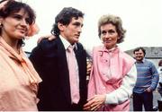 10 June 1985; World boxing featherweight champion Barry McGuigan, accompanied by his wife Sandra, left, is greeted by his mother Katie on his arrival home in Clones, Monaghan, on his return after beating Eusebio Pedroza at Loftus Road in London to win the world featherweight title. Photo by Ray McManus/Sportsfile